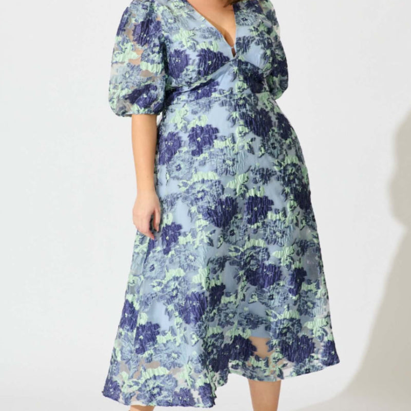 Opulence Midi Dress In Blue - Floral Organza Jacquard, available at: https://www.daltik.com/