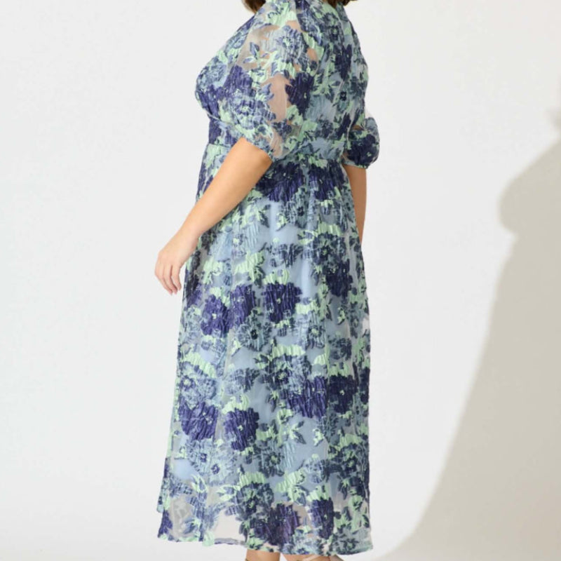 Opulence Midi Dress In Blue - Floral Organza Jacquard, available at: https://www.daltik.com/