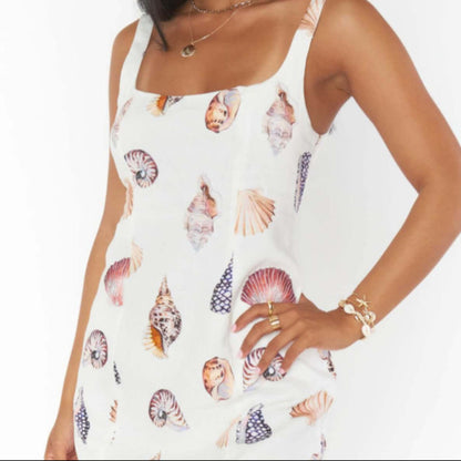 Steph Mini Dress ~ Shell Linen, available at: https://www.daltik.com/