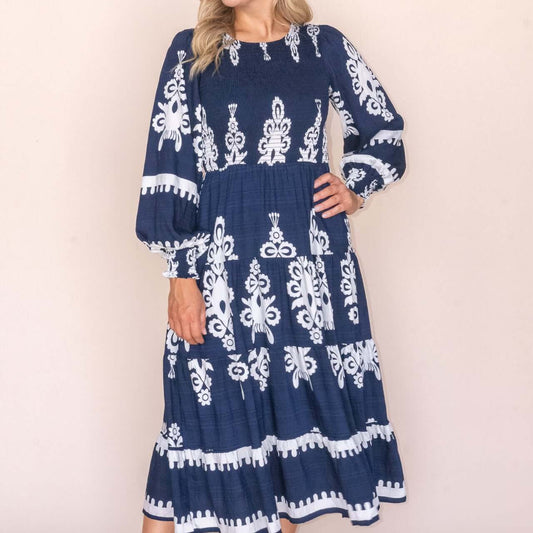 Whisper Midi Dress in Navy, available at: https://www.daltik.com/