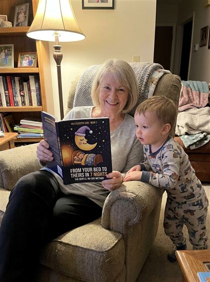 Grandmother and grandson with Book 1